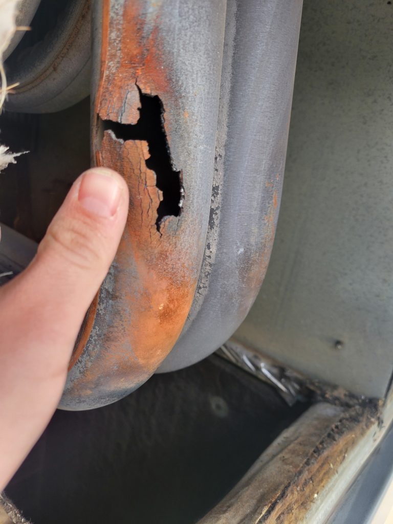 Commercial HVAC Cody WY cracked heat exchanger found during rooftop unit inspection